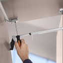 Charnière relevable de cuisine AVENTOS HF Top Blum pour portes pliantes